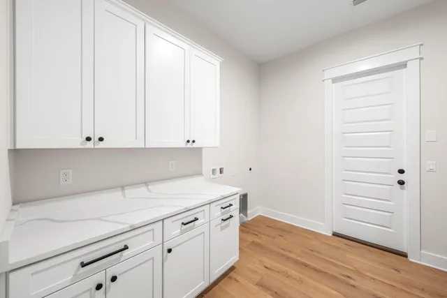a bathroom with 2 sink and a mirror