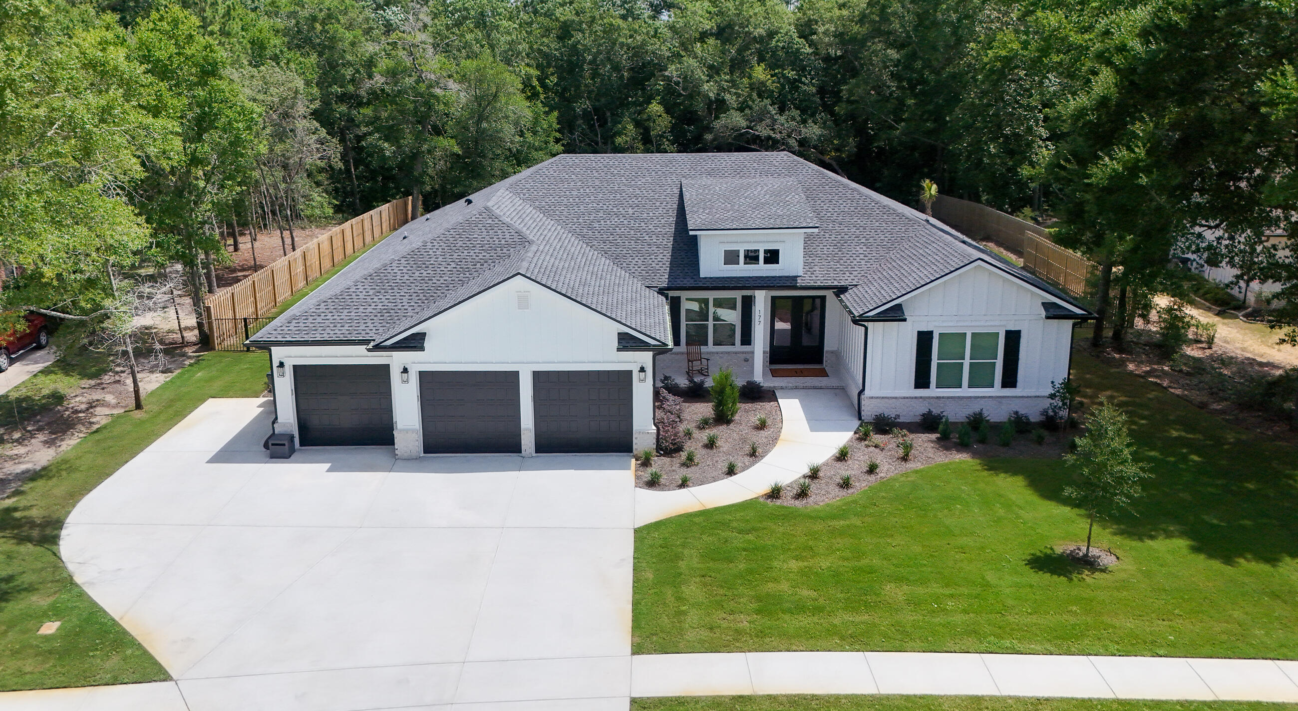 177 Harmony Way Freeport, FL 32439 - Photo 50 of 87 a house that has tree in front of it