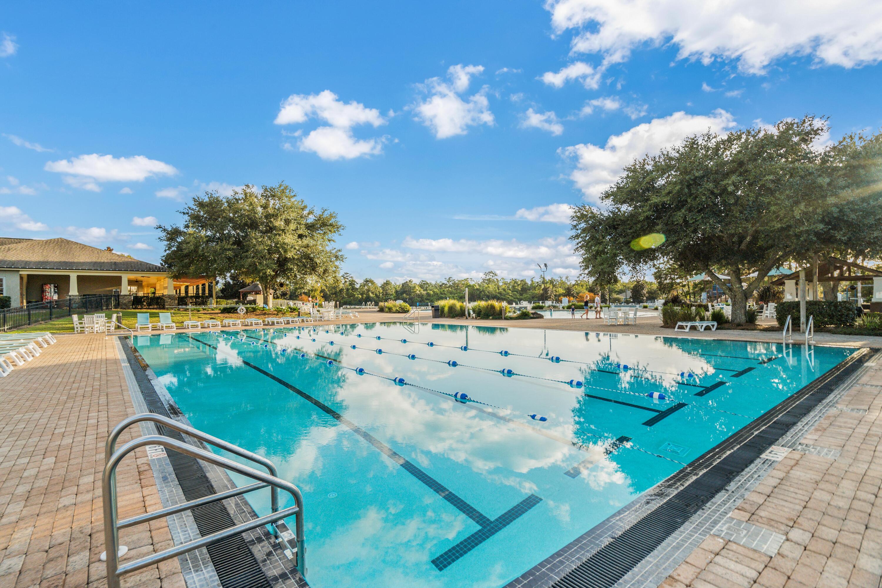 177 Harmony Way Freeport, FL 32439 - Photo 74 of 87 a view of a swimming pool with a patio