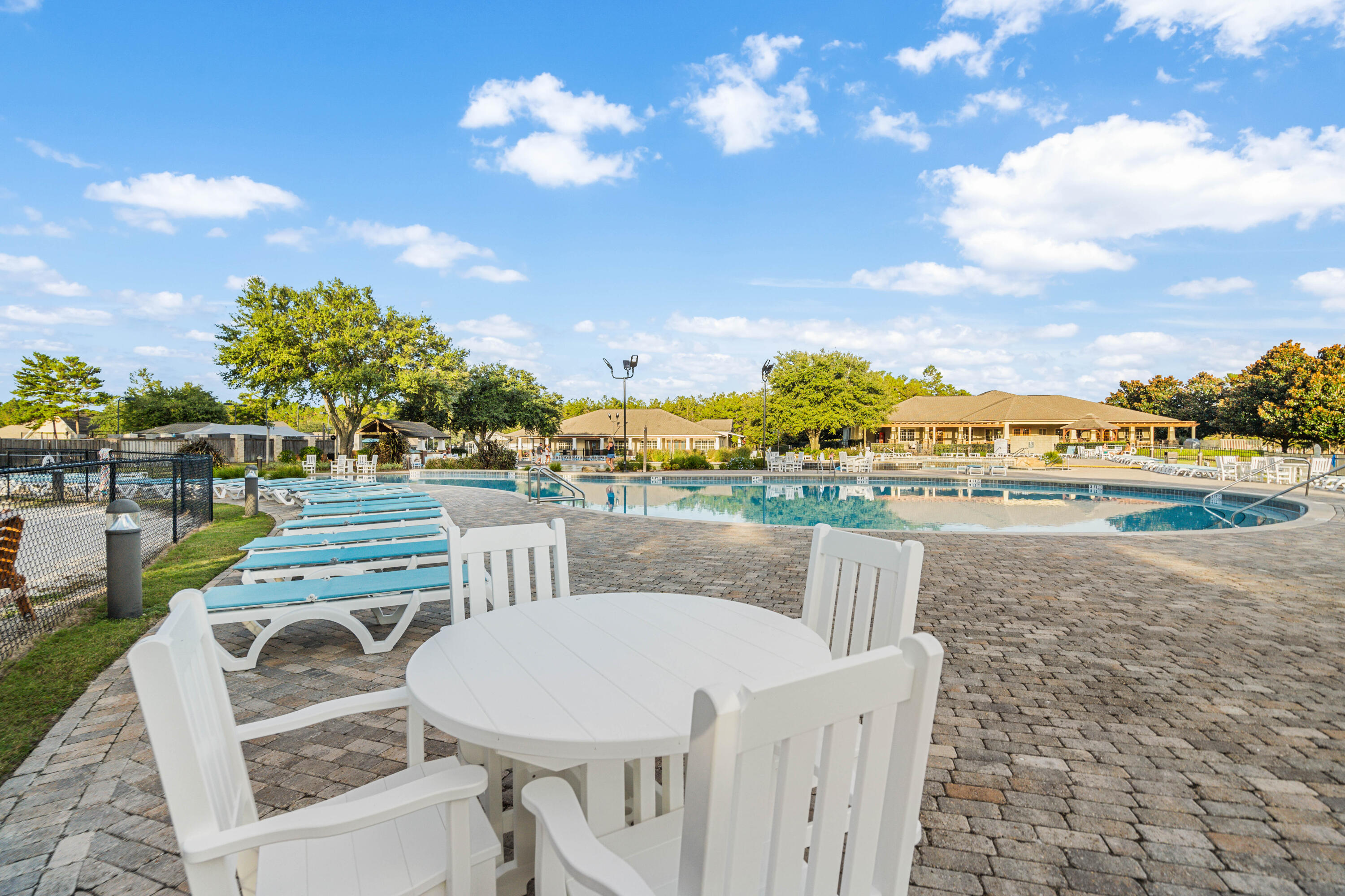 177 Harmony Way Freeport, FL 32439 - Photo 77 of 87 a view of a swimming pool and a terrace