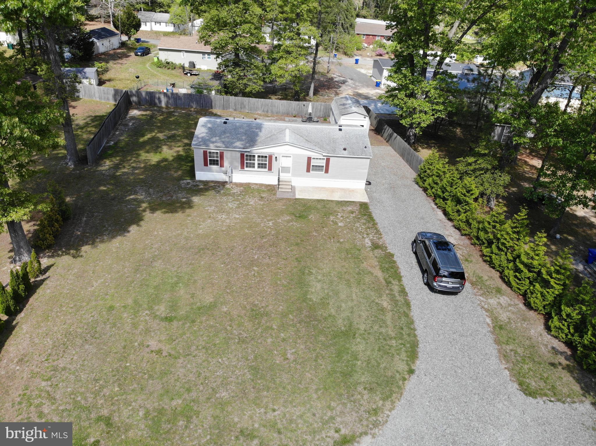22609 Camp Arrowhead Road Lewes, DE 19958 - Photo 43 of 48 an aerial view of a house with garden space and street view