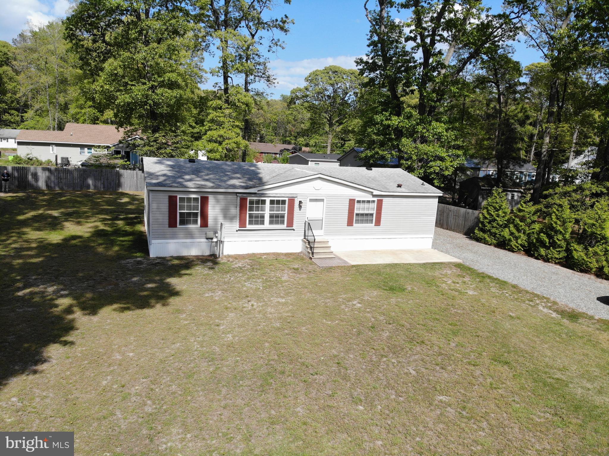 22609 Camp Arrowhead Road Lewes, DE 19958 - Photo 48 of 48 a aerial view of a house with a yard