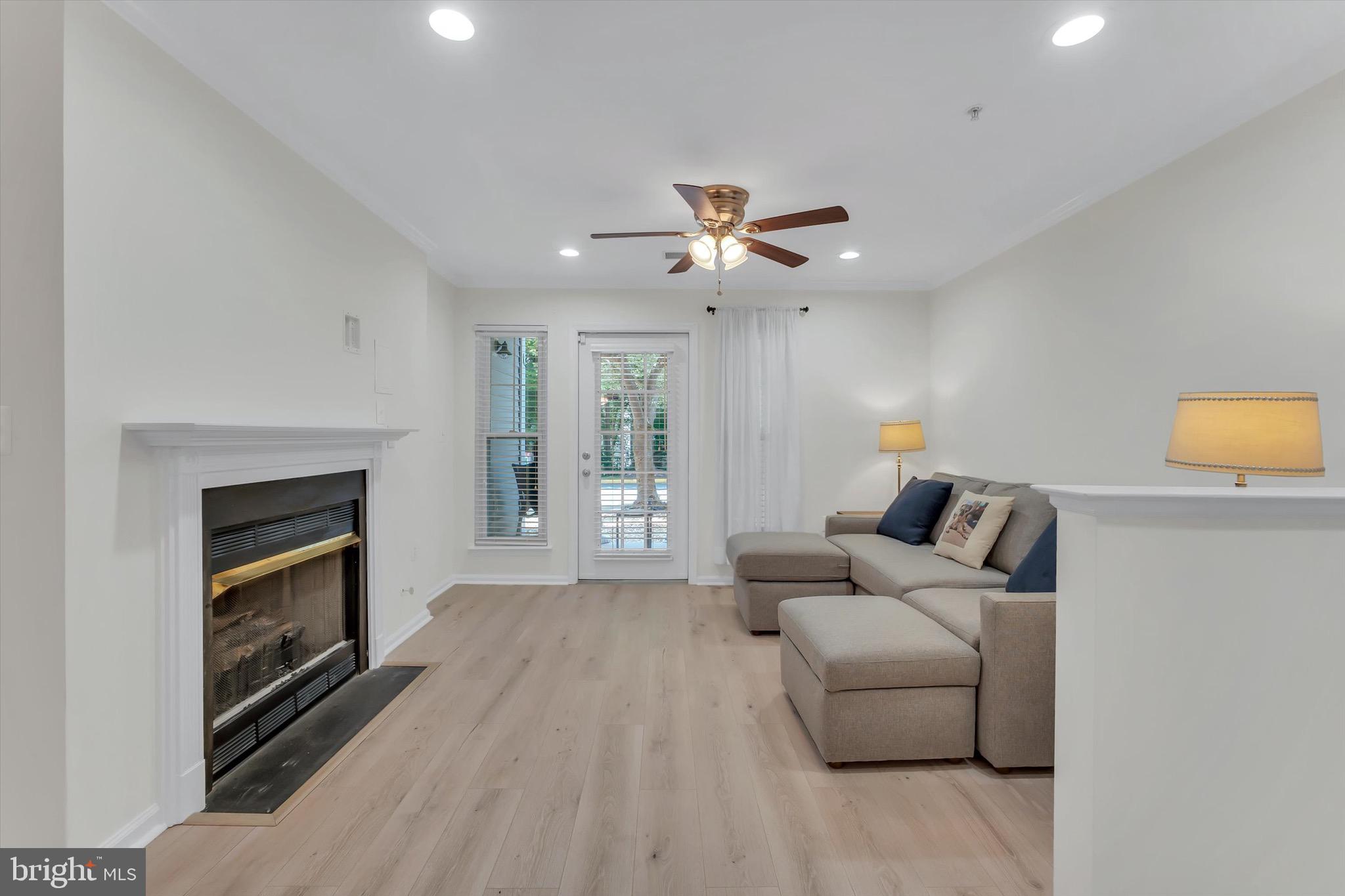 1516 North Point Drive, Unit 1 Reston, VA 20194 - Photo 11 of 32 Living Room w Gas Fireplace