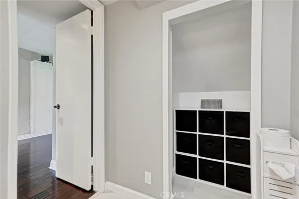 a view of closet area with empty racks