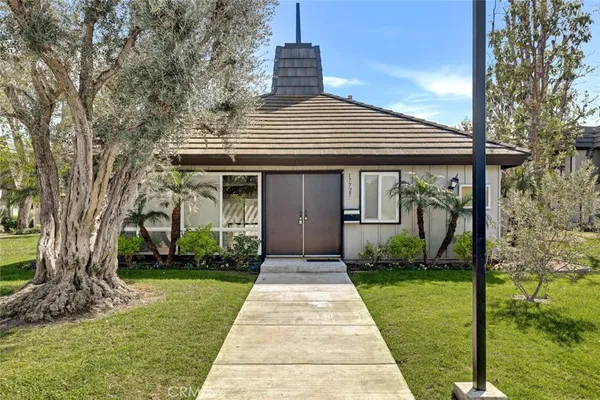 an aerial view of residential building and street