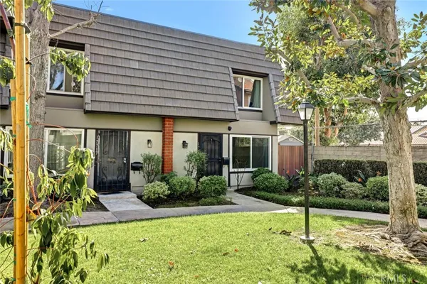 a front view of a house with a garage