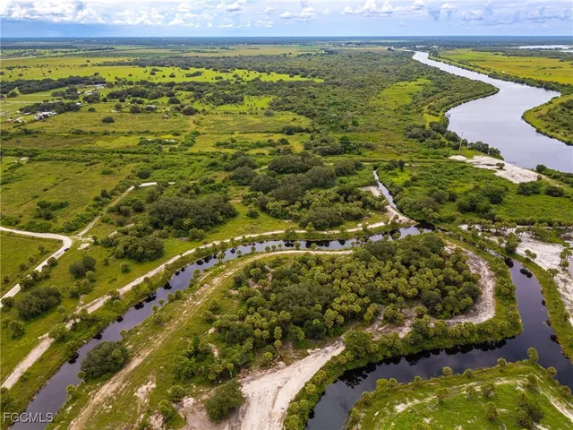 a view of a swimming pool with an ocean view