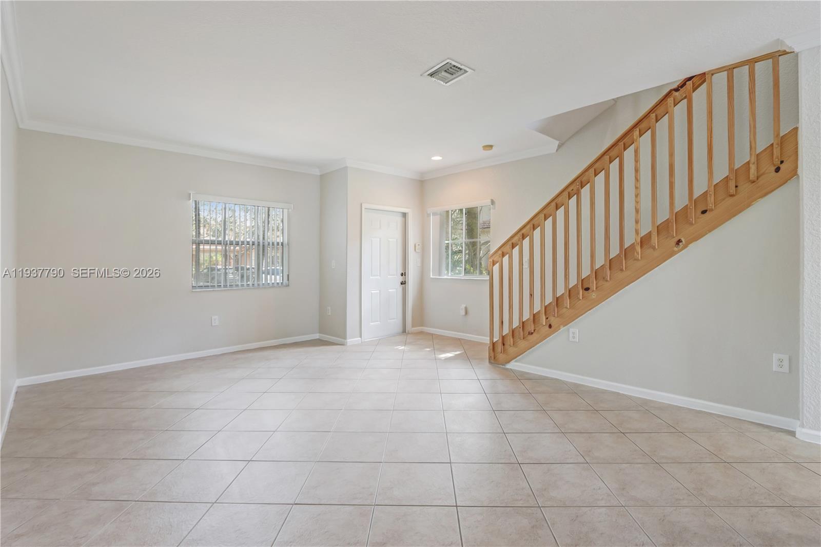 2830 Southwest 83rd Terrace, Unit 101 Miramar, FL 33025 - Photo 5 of 21 a view of an entryway with stairs
