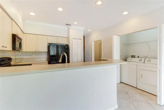 a view of a kitchen with a sink