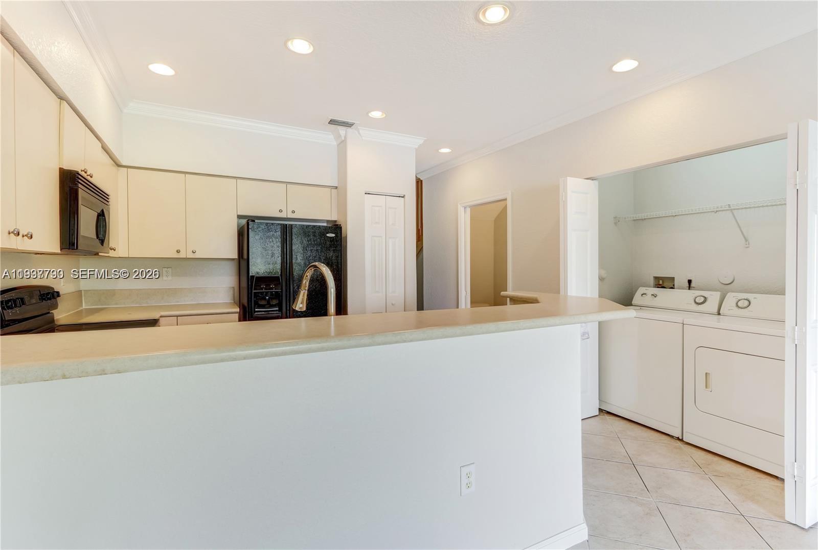 2830 Southwest 83rd Terrace, Unit 101 Miramar, FL 33025 - Photo 6 of 15 a view of a kitchen with a sink