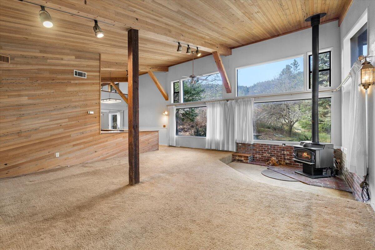 6526 Tunnel Loop Road Grants Pass, OR 97526 - Photo 14 of 54 a view of a door and wooden roof