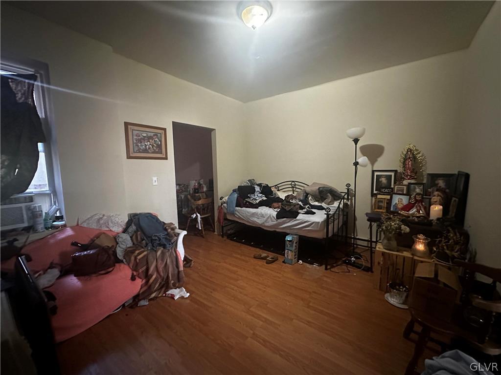1306 East 4th Street Bethlehem, PA 18015 - Photo 13 of 47 a living room with furniture and a wooden floor