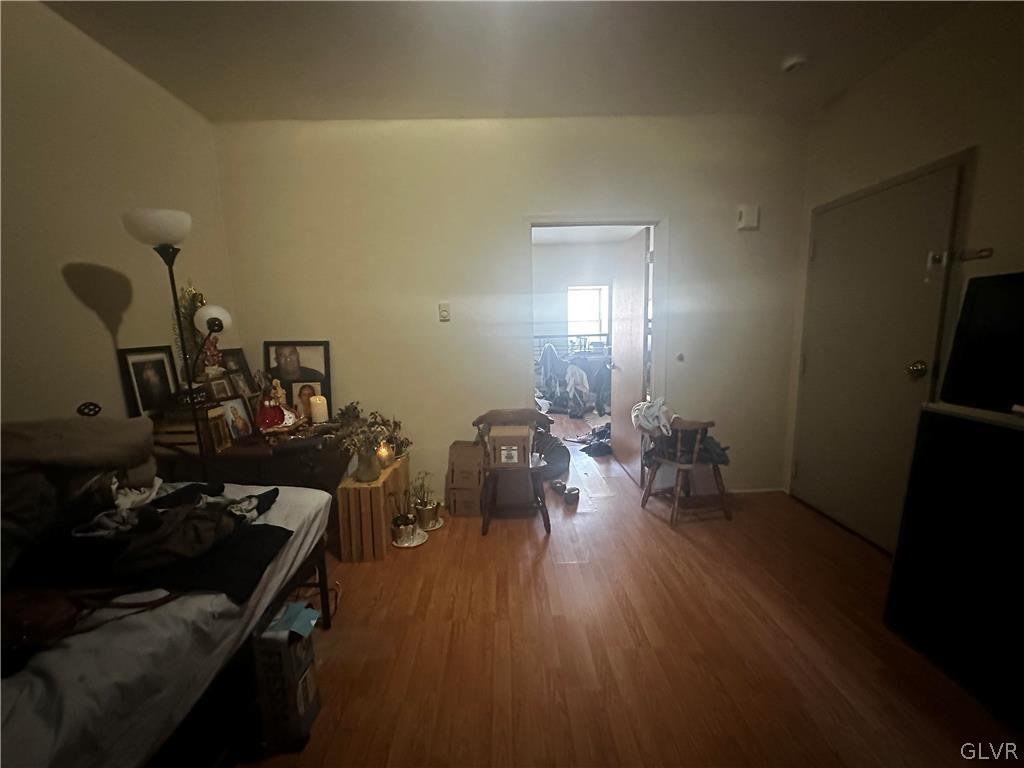 1306 East 4th Street Bethlehem, PA 18015 - Photo 14 of 47 a living room with furniture and a wooden floor