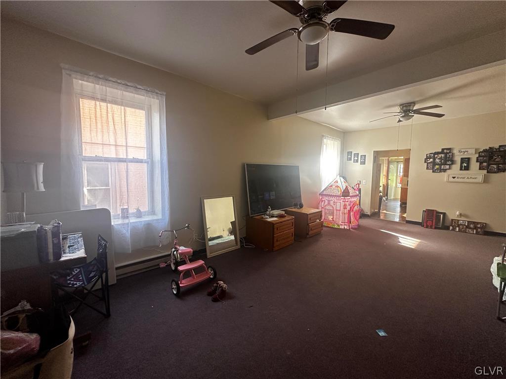 1306 East 4th Street Bethlehem, PA 18015 - Photo 19 of 47 a living room with furniture and a window