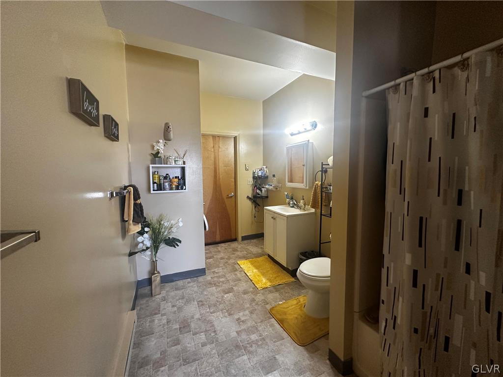 1306 East 4th Street Bethlehem, PA 18015 - Photo 41 of 47 a bathroom with a sink and toilet
