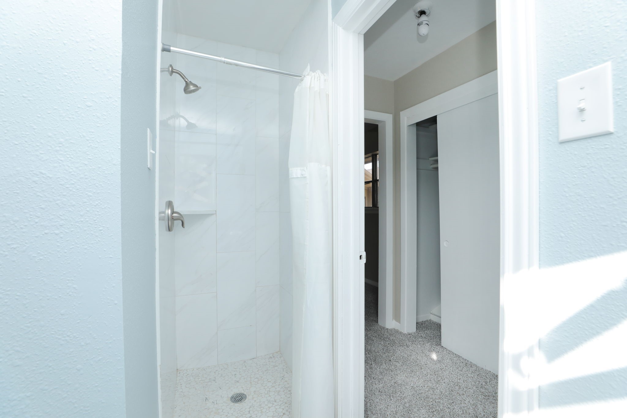 8235 Dover Street Houston, TX 77061 - Photo 28 of 36 a view of a bathroom from a hallway