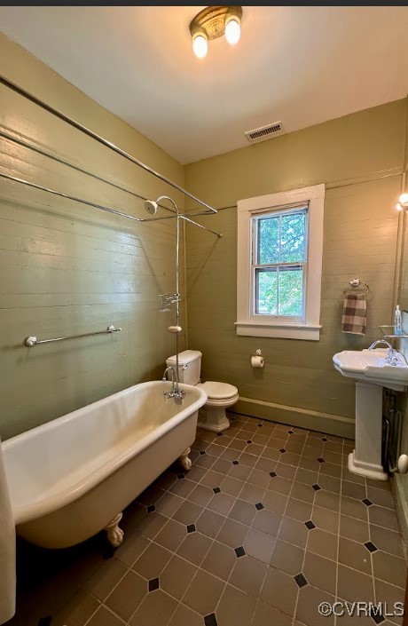 600 Virginia Street Ashland, VA 23005 - Photo 16 of 33 a bathroom with a sink a toilet and a mirror