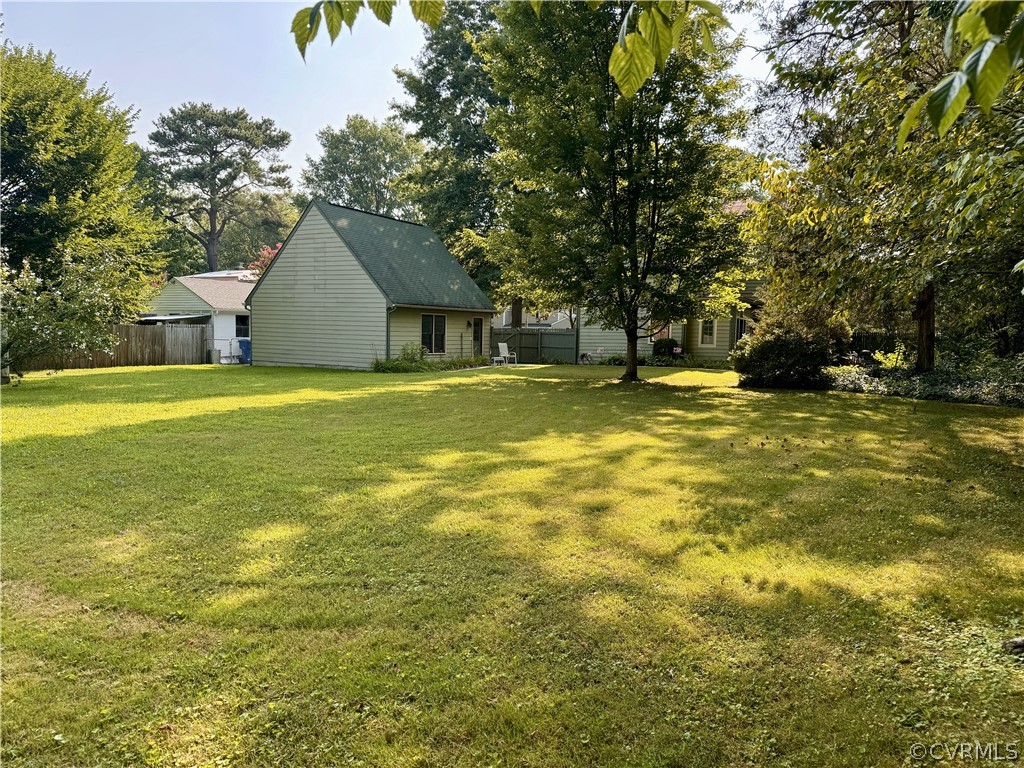 600 Virginia Street Ashland, VA 23005 - Photo 28 of 33 a view of a house with a yard and swimming pool