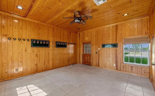 a view of a hallway with a chandelier