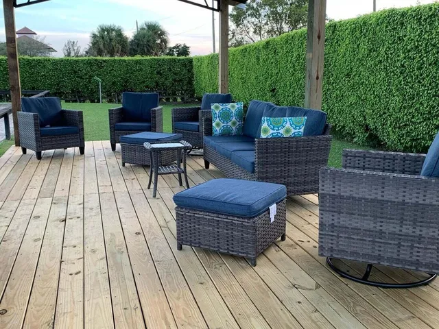 a view of backyard with seating space