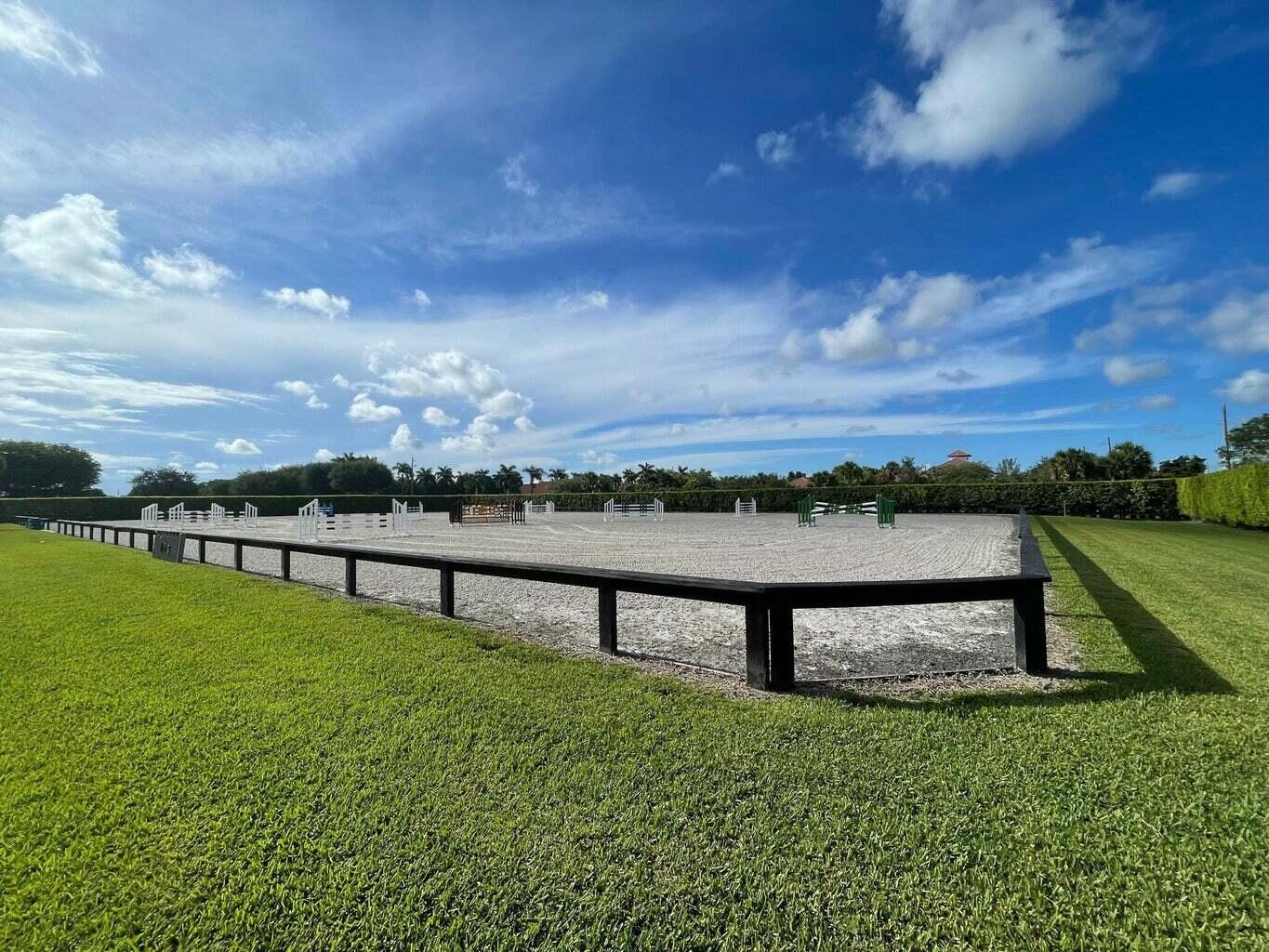 4591 S Road Wellington, FL 33414 - Photo 37 of 42 a view of a terrace with lake view
