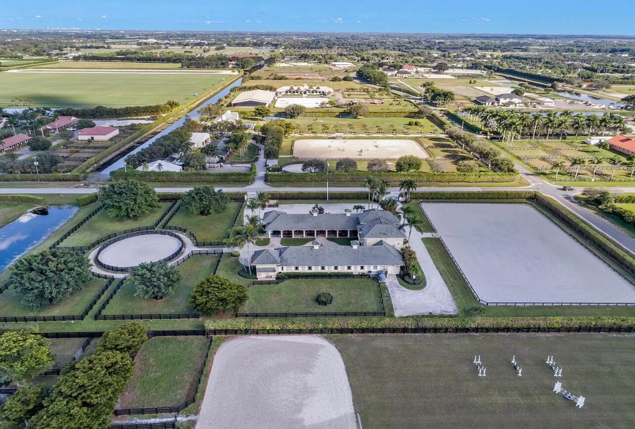 4591 S Road Wellington, FL 33414 - Photo 7 of 42 an aerial view of residential houses with outdoor space