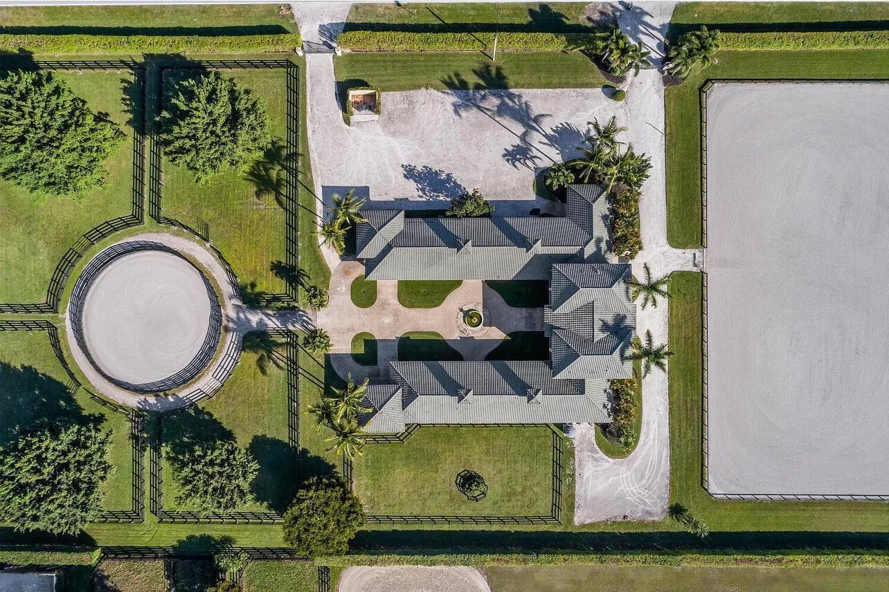 4591 S Road Wellington, FL 33414 - Photo 8 of 42 an aerial view of a house with outdoor space