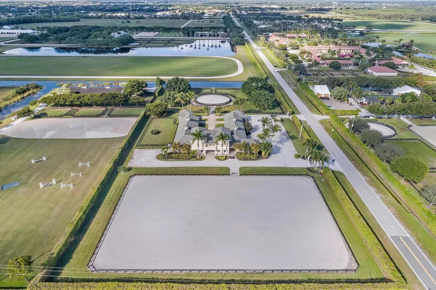 4591 S Road Wellington, FL 33414 - Photo 9 of 42 a view of swimming pool from a balcony