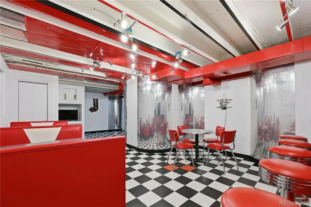 a room with furniture and wooden floor