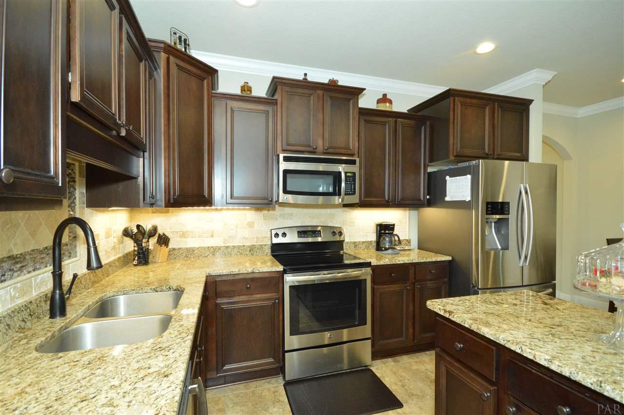 6300 Ladera Trail Pace, FL 32571 - Photo 11 of 36 with granite countertops & stainless appliances