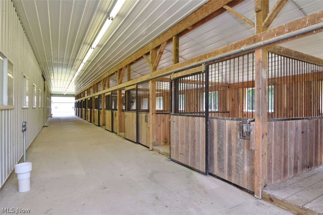15227 Leroy Road Thompson, OH 44086 - Photo 10 of 50 10 horse stalls. Water available and drains go right into the floor.