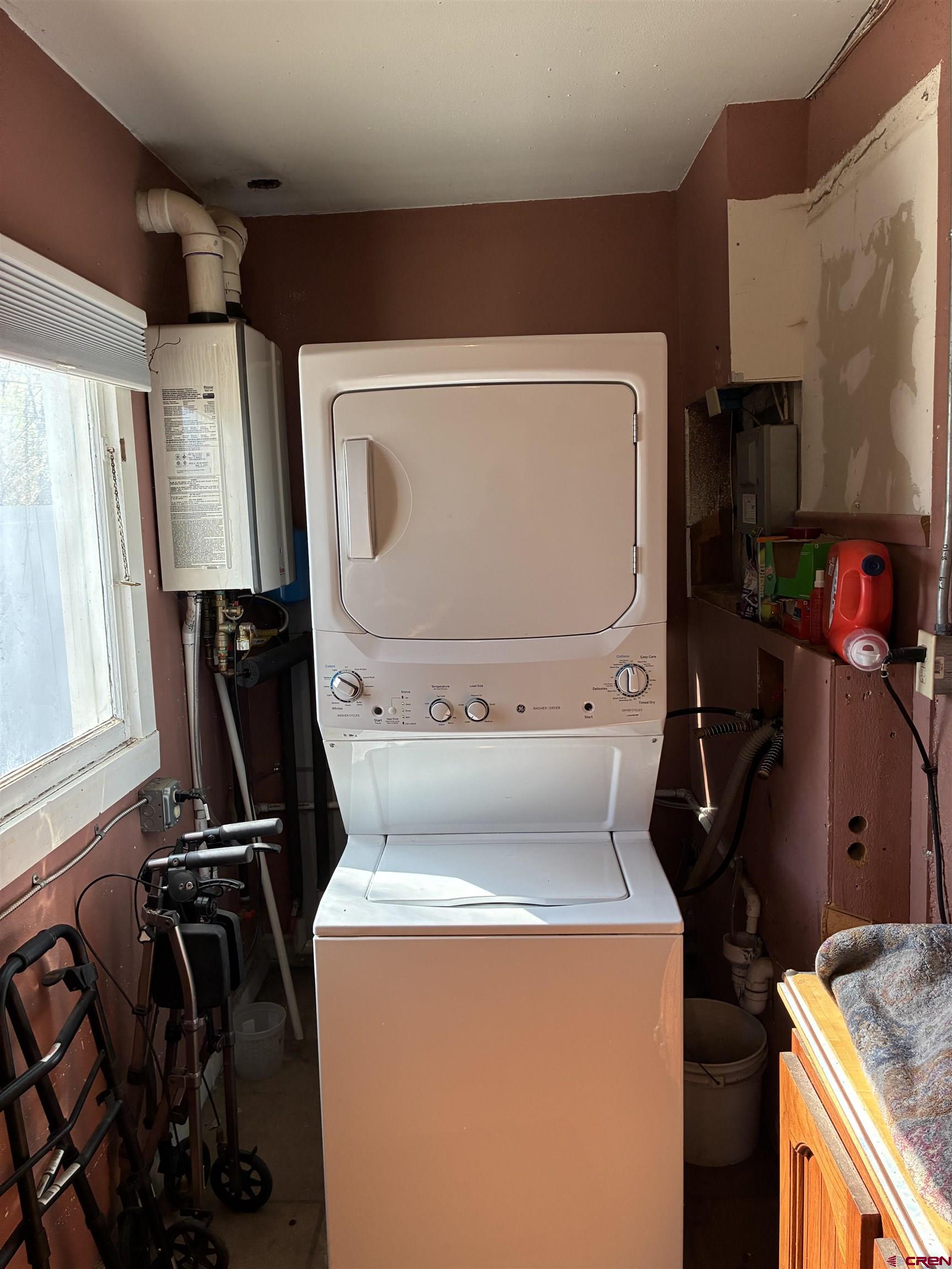 1002 State Avenue Alamosa, CO 81101 - Photo 15 of 19 a utility room with dryer and washer