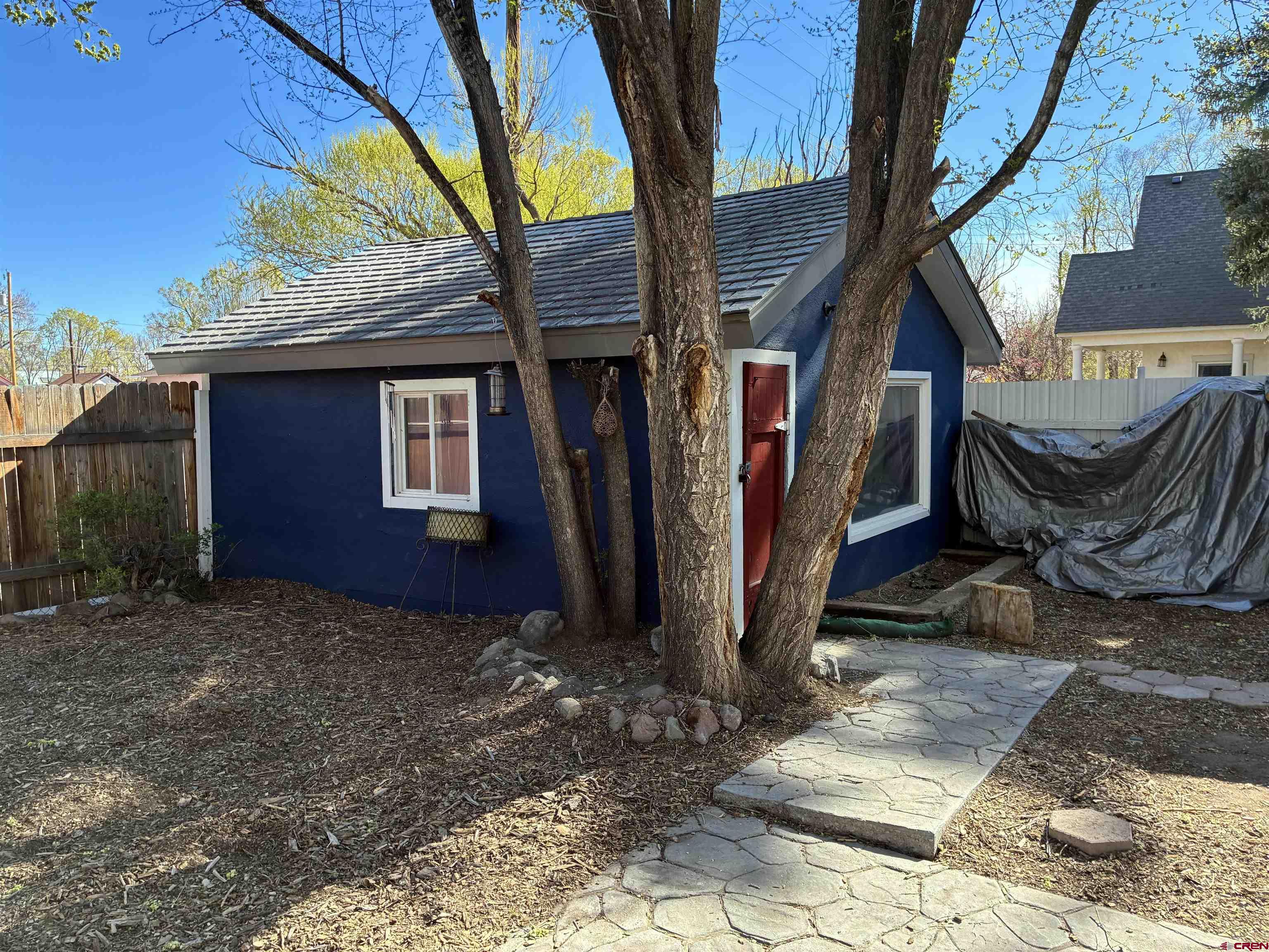 1002 State Avenue Alamosa, CO 81101 - Photo 5 of 19 a view of a house with a patio