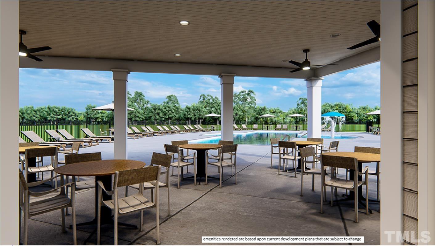 246 Oak Branch Trail Garner, NC 27529 - Photo 22 of 28 a view of a dining room with furniture window and outside view