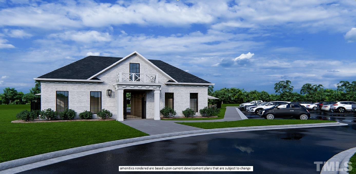246 Oak Branch Trail Garner, NC 27529 - Photo 28 of 28 a front view of a house with a garden