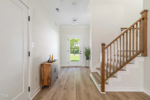 a view of entryway with wooden floor
