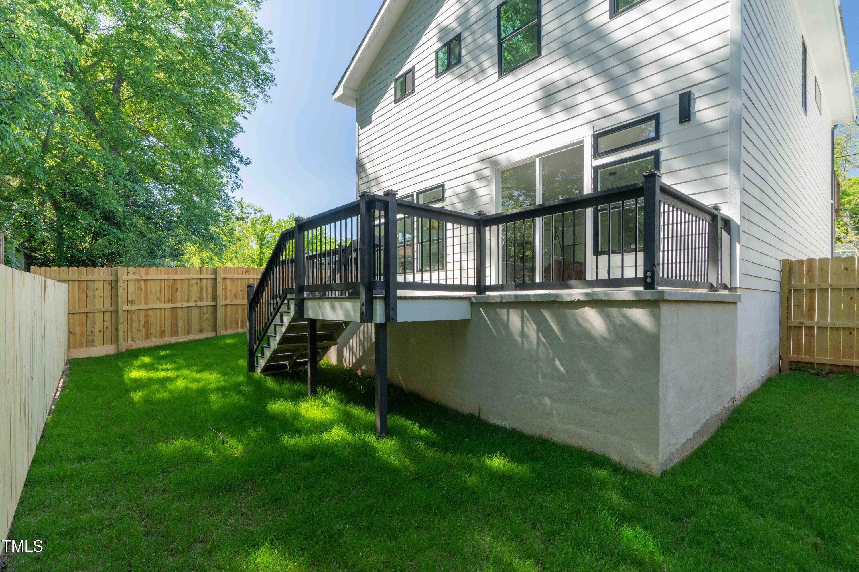 1124 Upchurch Street Raleigh, NC 27610 - Photo 42 of 45 a view of a backyard with a garden