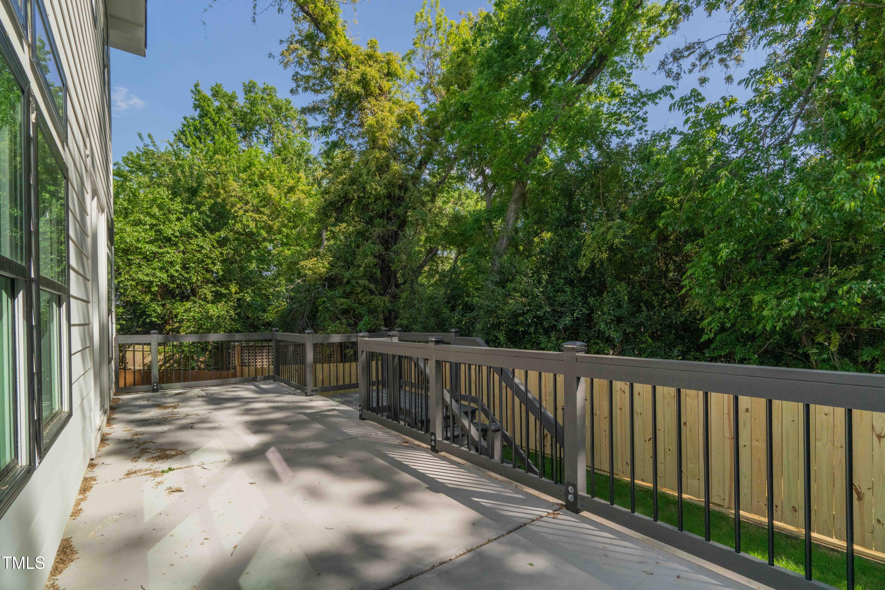 1124 Upchurch Street Raleigh, NC 27610 - Photo 44 of 45 a view of balcony with yard