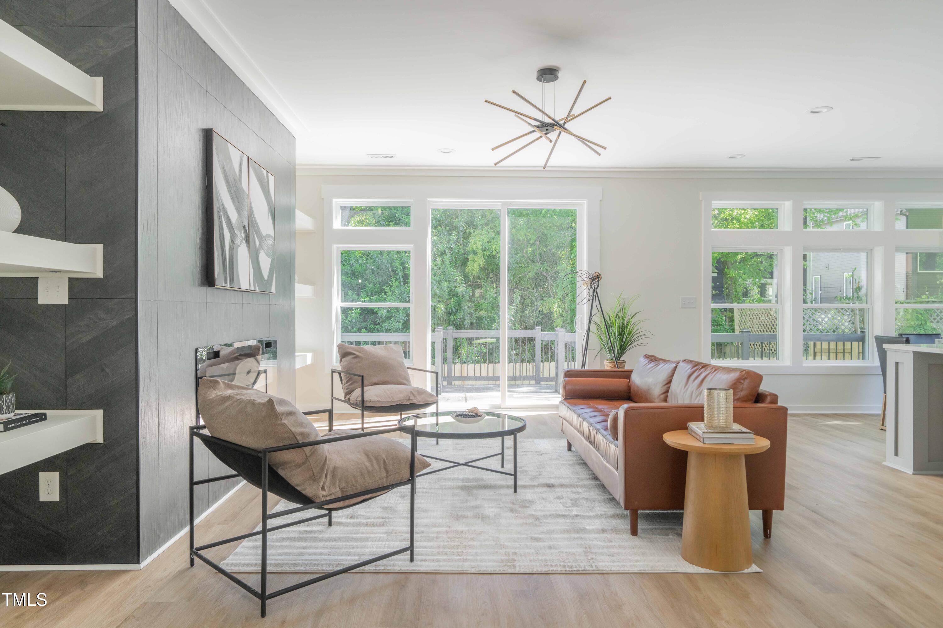1124 Upchurch Street Raleigh, NC 27610 - Photo 7 of 45 a living room with furniture and a large window