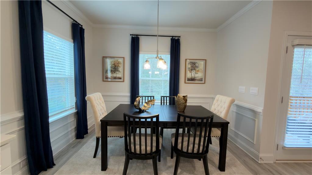620 Bald Ridge Circle Demorest, GA 30535 - Photo 12 of 43 a view of a dining room with furniture and window