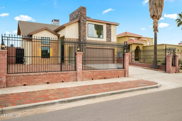 a kitchen with stainless steel appliances granite countertop a stove refrigerator and microwave