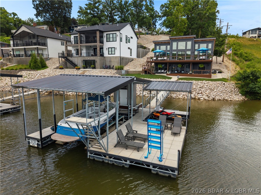 1151 Oak Road Osage Beach, MO 65065 - Photo 3 of 63 Private waterfront setting featuring a gentle lot,