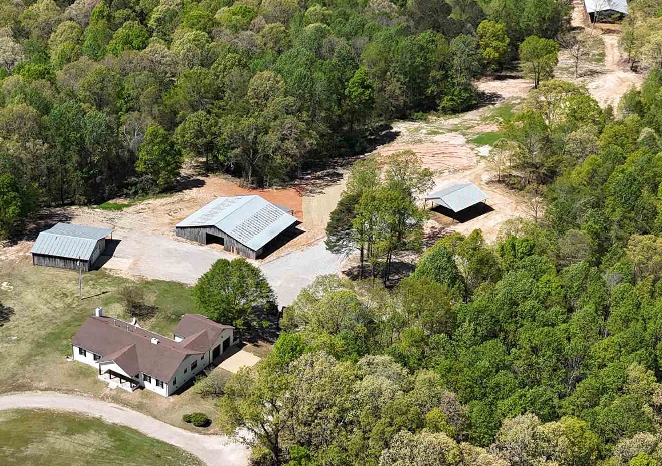 an aerial view of house with yard