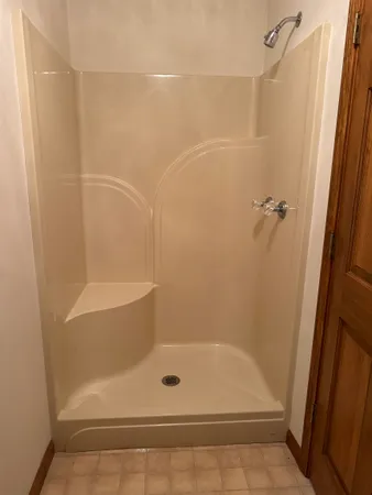 a bathroom with a bath tub