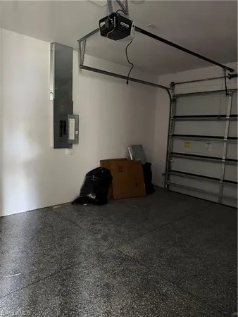 a view of a room with stairs and a wooden floor