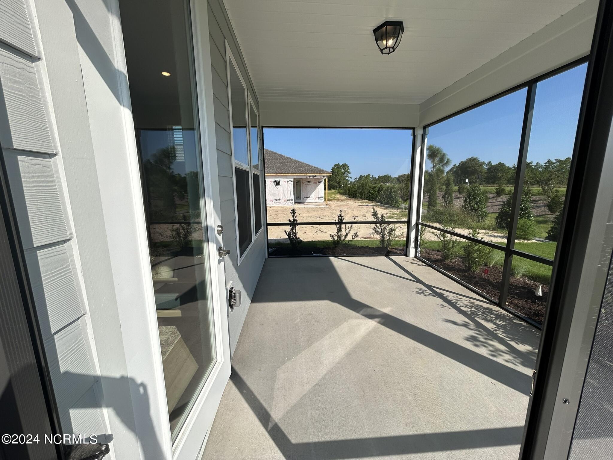 6020 Moonshell Loop Wilmington, NC 28412 - Photo 36 of 48 Screened-in Patio