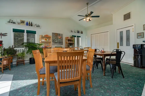 a view of a dining room with furniture