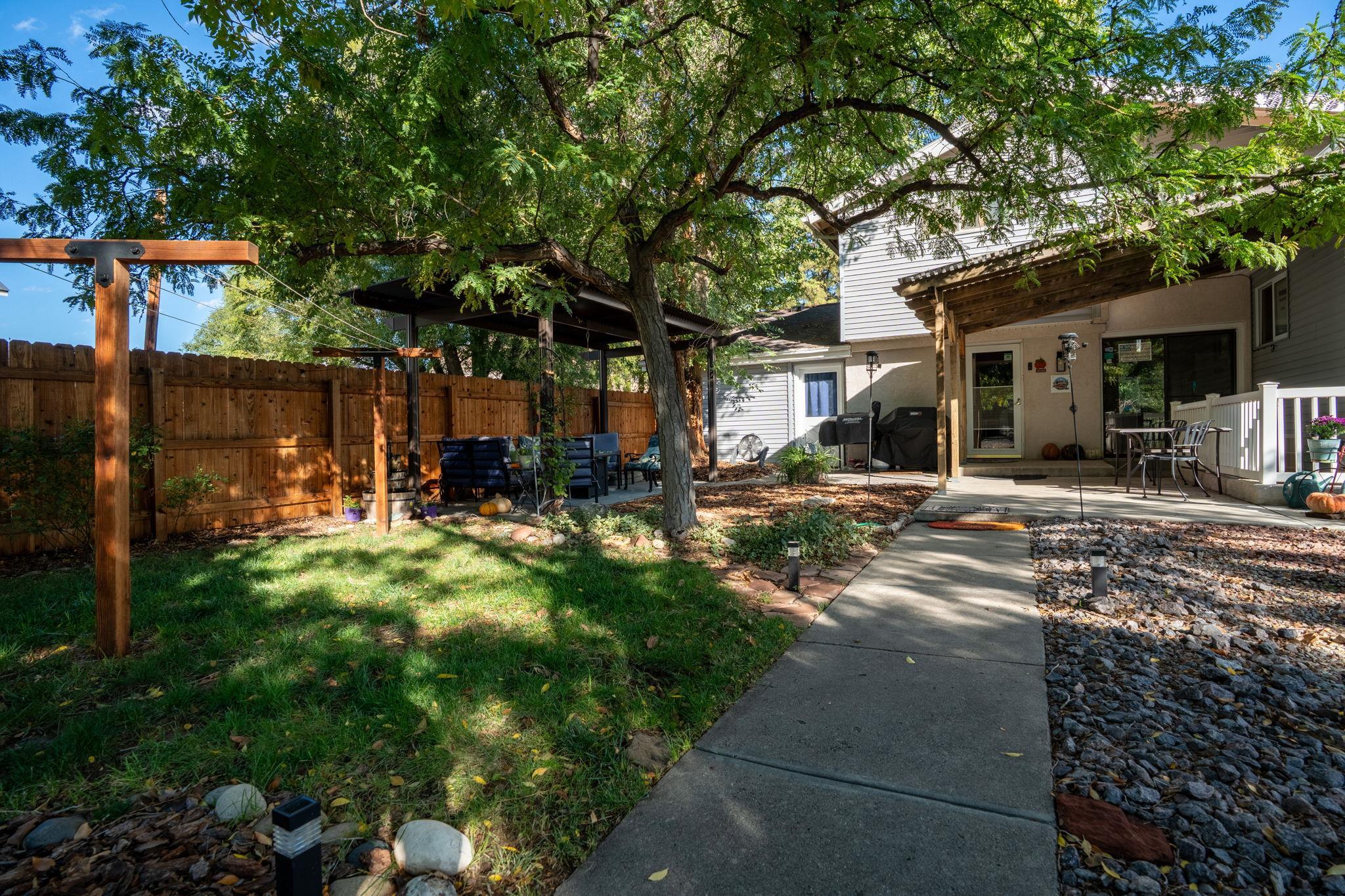 3587 G Road Palisade, CO 81526 - Photo 3 of 42 a front view of a house with a yard