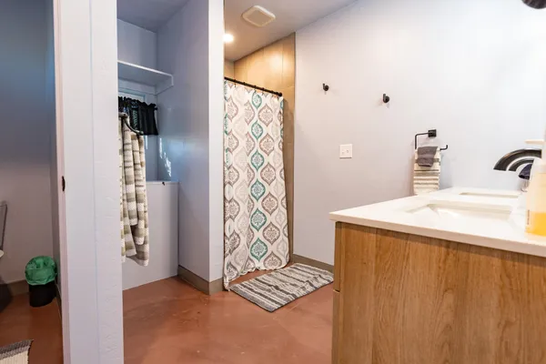 a bathroom with a sink and a mirror