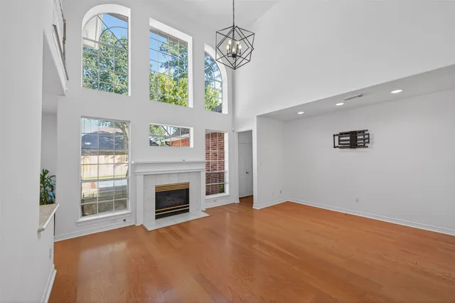 a bathroom with a sink double vanity and a large mirror